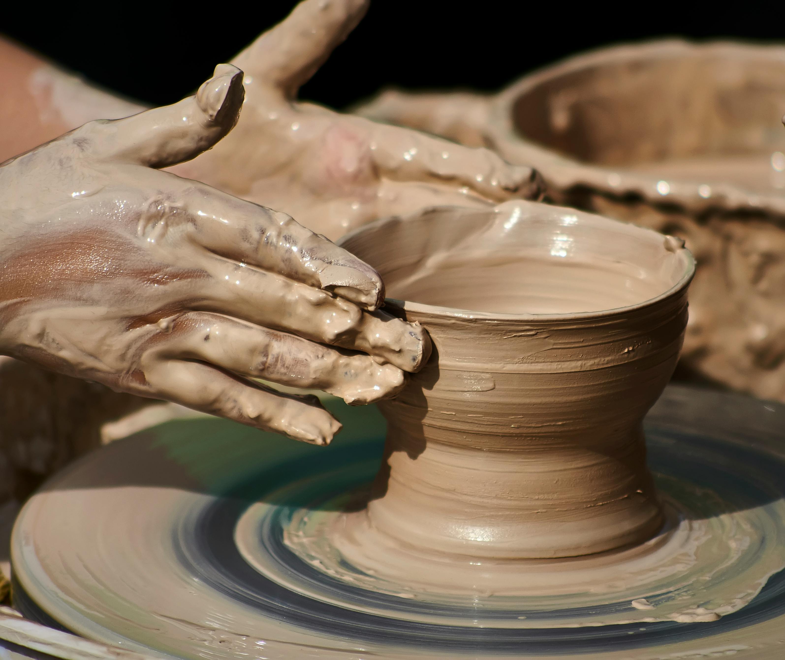 Picture of person working pottery wheel